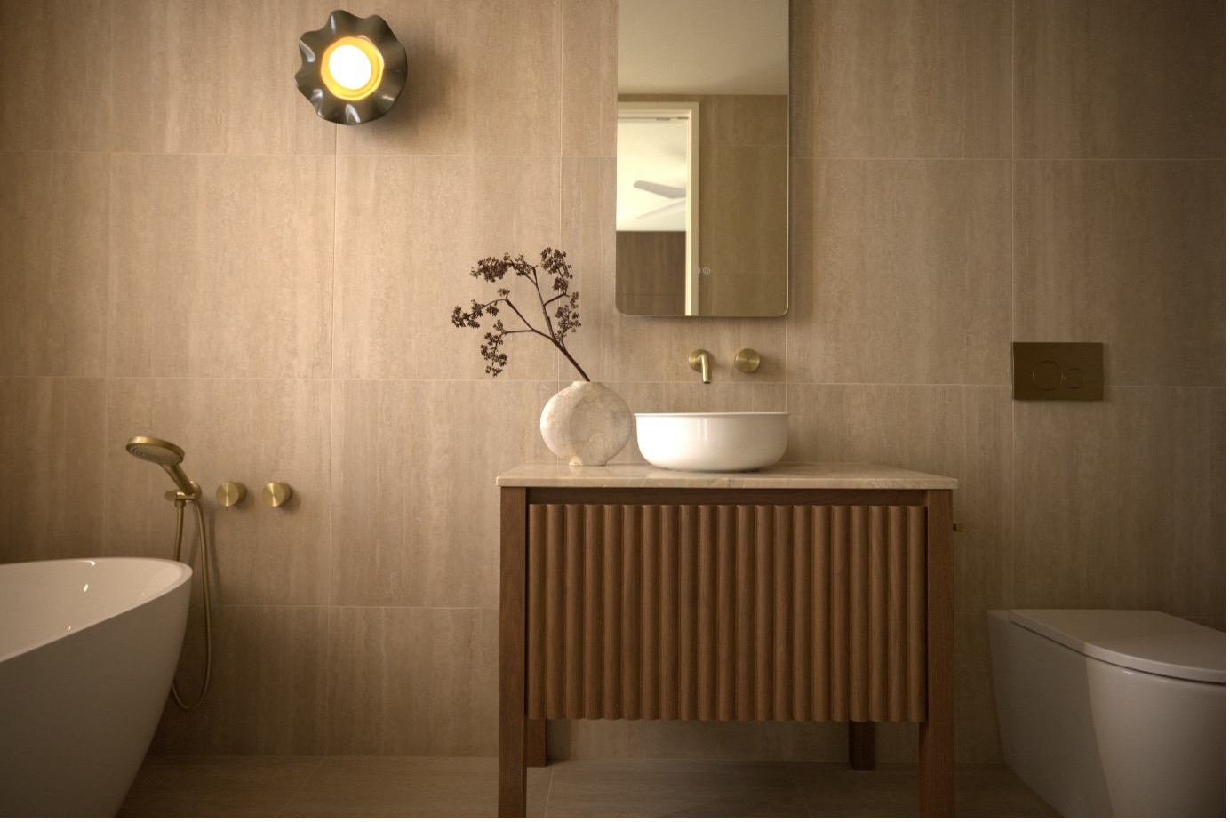 Lucent Leggero shower and progressive wall mixer with diverter in brushed gold, lead free, model 15039PBG, styled in a bathroom setting